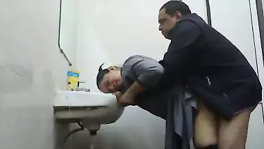 Wife in abroad fucked by office manager in washroom