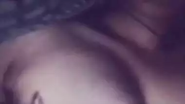 Indian aunty squeezes her own boobs like crazy in close-up video