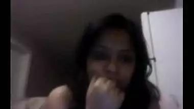 Amateur Indian girlfriend strips on webcam for lover